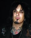 nikki sixx text and star tattoo